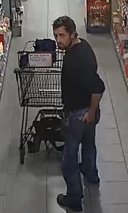 unbekannter Täter im Supermarkt mit Einkaufswagen